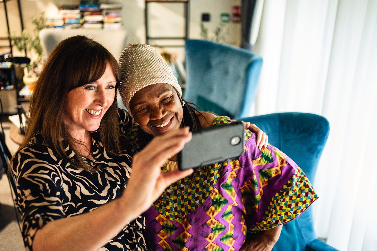 Charlie Norman, MSV Chief Exec taking selfie with customer 